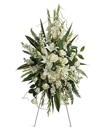 Heartfelt Sympathy Spray - all-white standing floral arrangement with lilies, roses, gladioli and lush greenery on an easel