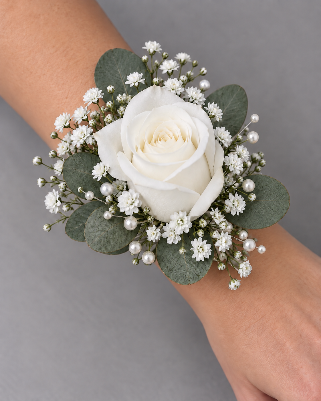 White wrist corsage without decorative ribbon